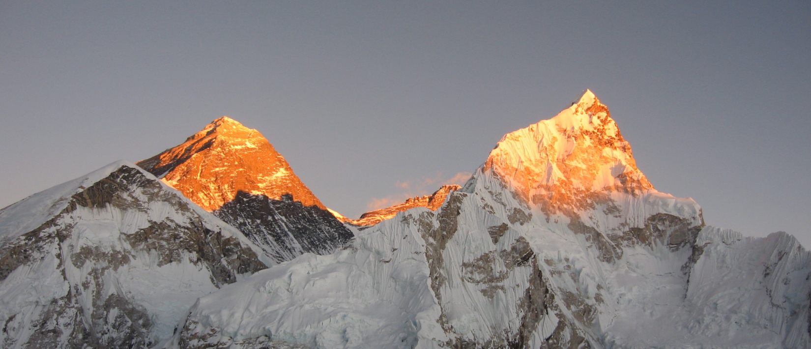 A photograph of sunrise at Mt. Everest, taken from the Kala Patthar viewpoint near Everest Base Camp in Nepal