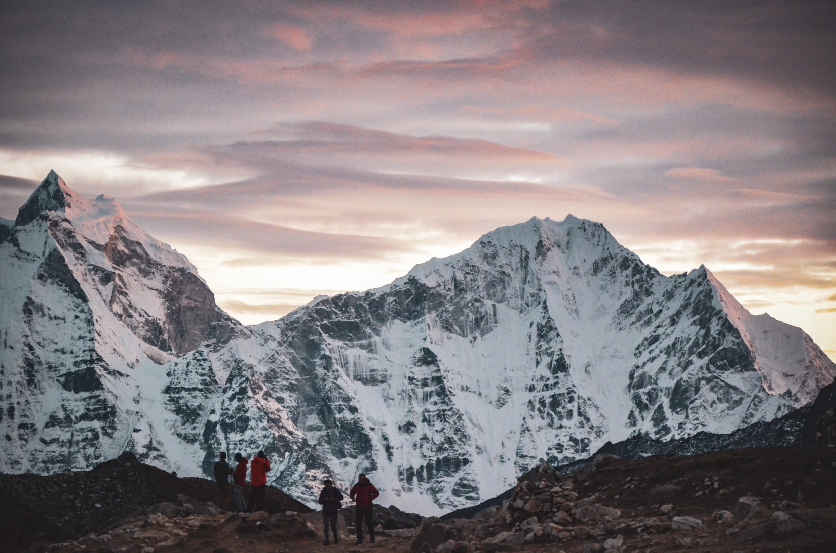 A photograph of Himalayan mountains near Everest Base Camp during sunrise